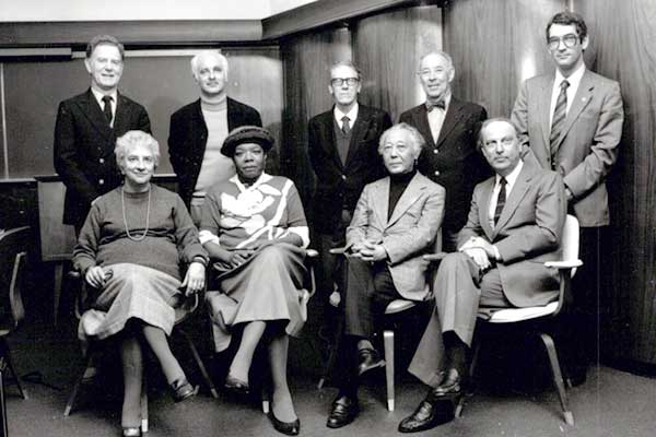 Maya Angelou with the 1986 Neustadt Jury (seated, left to right): Margherita Guidacci, Maya Angelou, Shuichi Kato, former WLT editor in chief Ivar Ivask; (standing, left to right) Sigurdur Magnússon, Adolf Muschg, José Luis Cano, Gregory Rabassa, Anthony Rudolf. Not pictured: Iordan Chimet, Mordecai Richler.